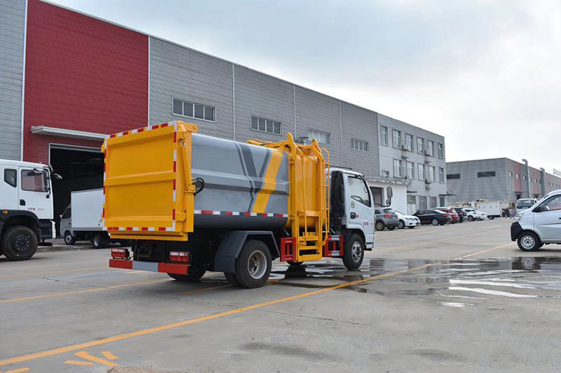 東風(fēng)D6藍(lán)牌7方側(cè)裝壓縮垃圾車